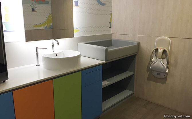 sink and padded diaper changing station