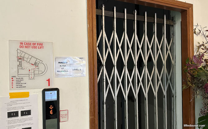 old-style elevator with metal grills