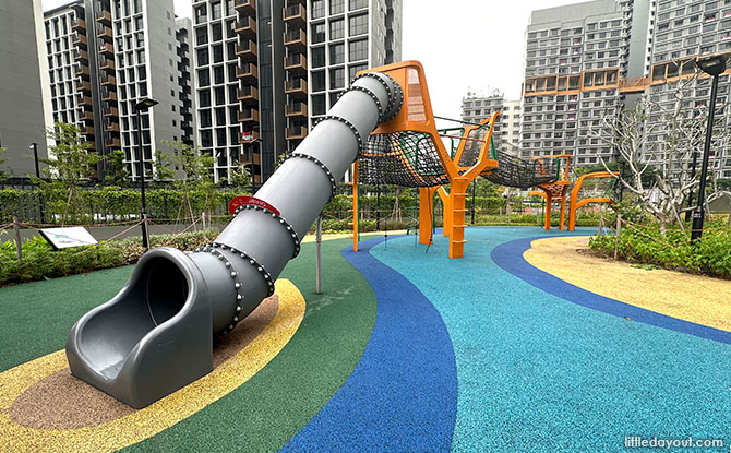 Grey slide at the banyan tree playground